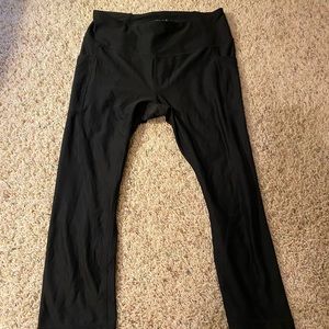 Reebok women’s black athletic workout capris.